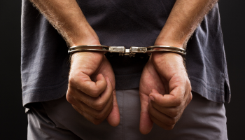Criminal with handcuffs