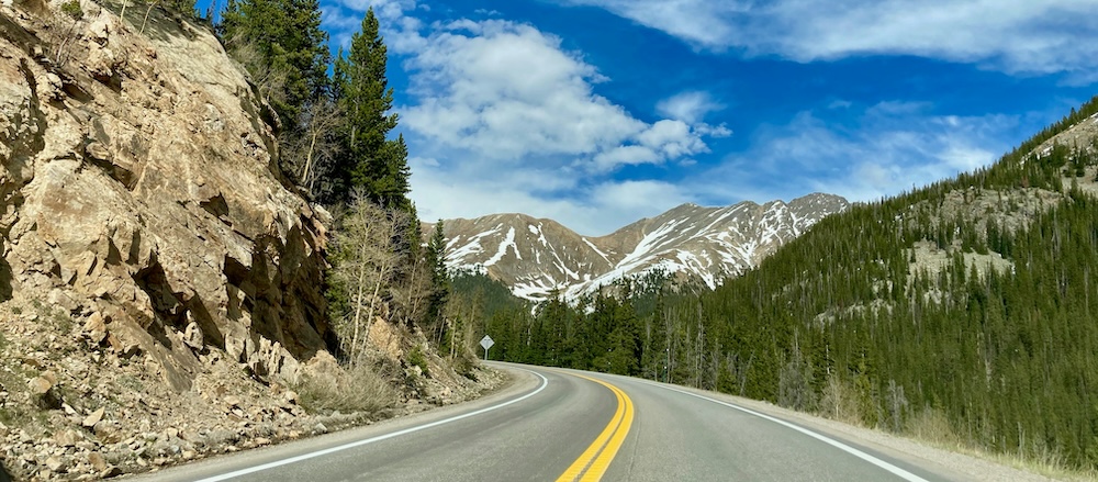 Colorado mountain highway representing Habitual Traffic Offender license revocation
