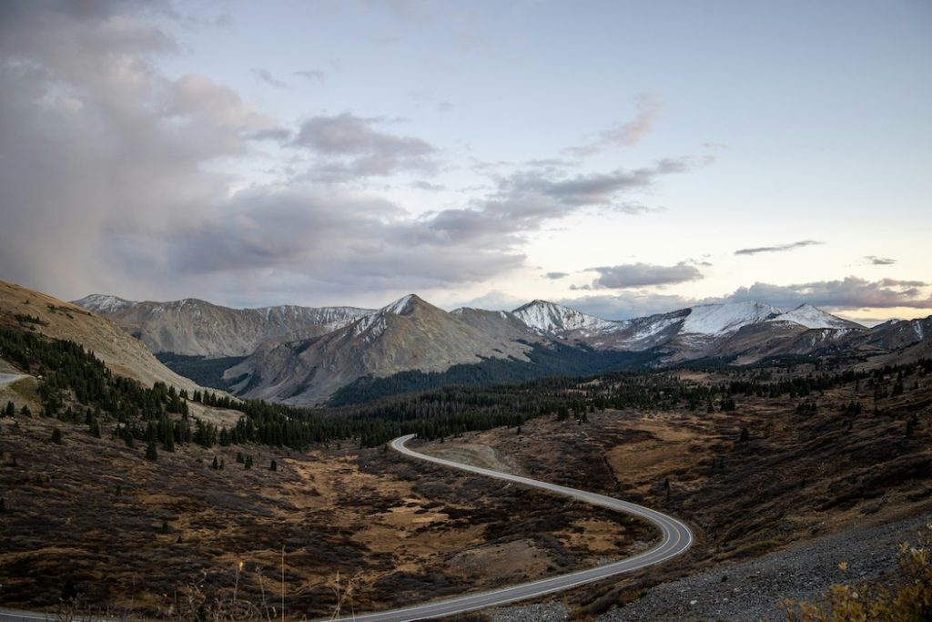 Colorado mountain highway symbolizing post-conviction relief, record sealing, and starting fresh in Colorado.
