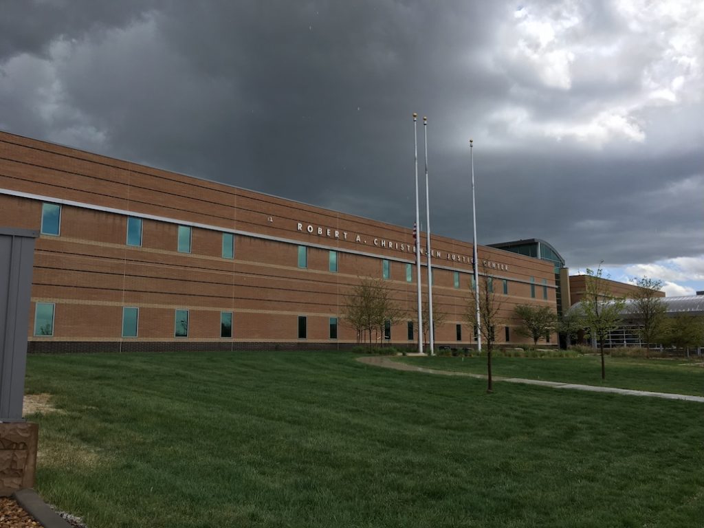 Douglas County Justice Center under cloudy skies — DUI cases heard here in Castle Rock, Colorado.