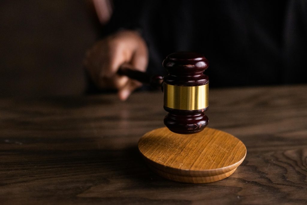 Judge’s gavel representing DUI-related driving-under-restraint charges in Colorado.