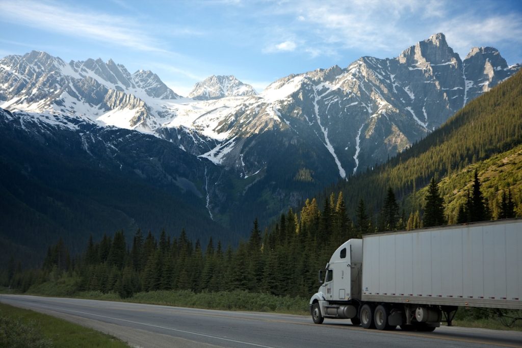 Semi truck traveling on a mountain highway